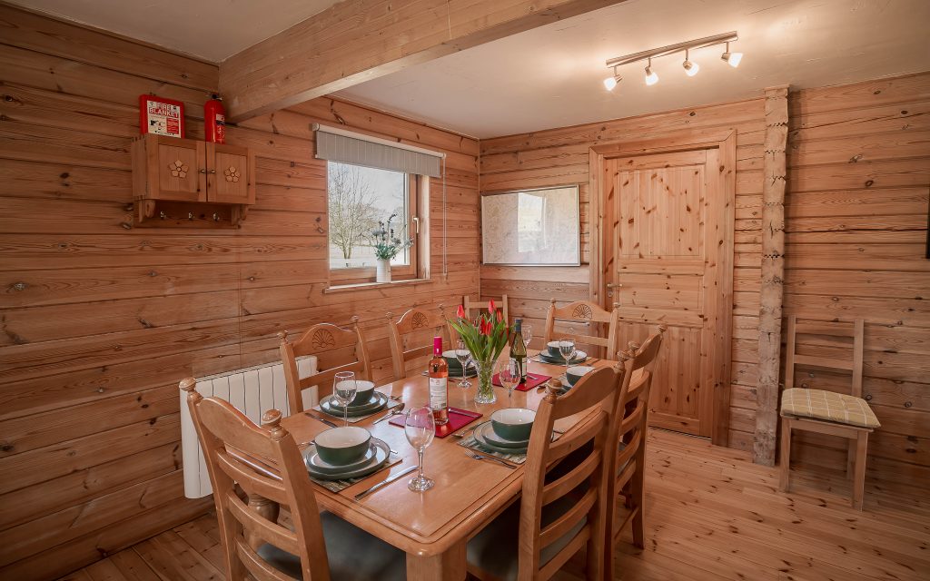 Self Catering Holiday Accommodation - Fully equipped kitchen with double oven, hob and grill, microwave, fridge, counter top freezer, dishwasher and dining table seating 8 people.